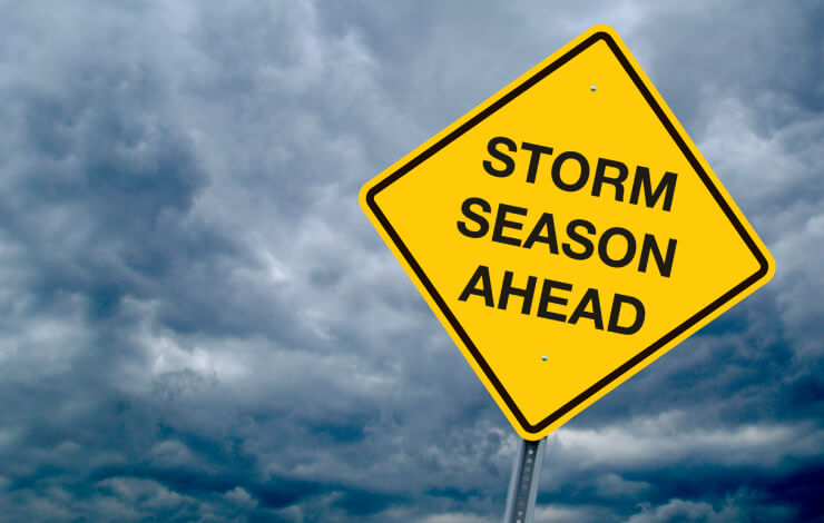 Image of 'Storm Season Ahead' sign
